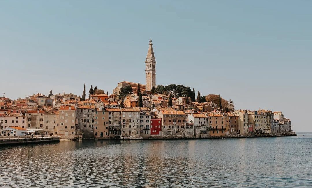A scenic view of the charming coastal towns and hills of Croatia during a RYA sailing course